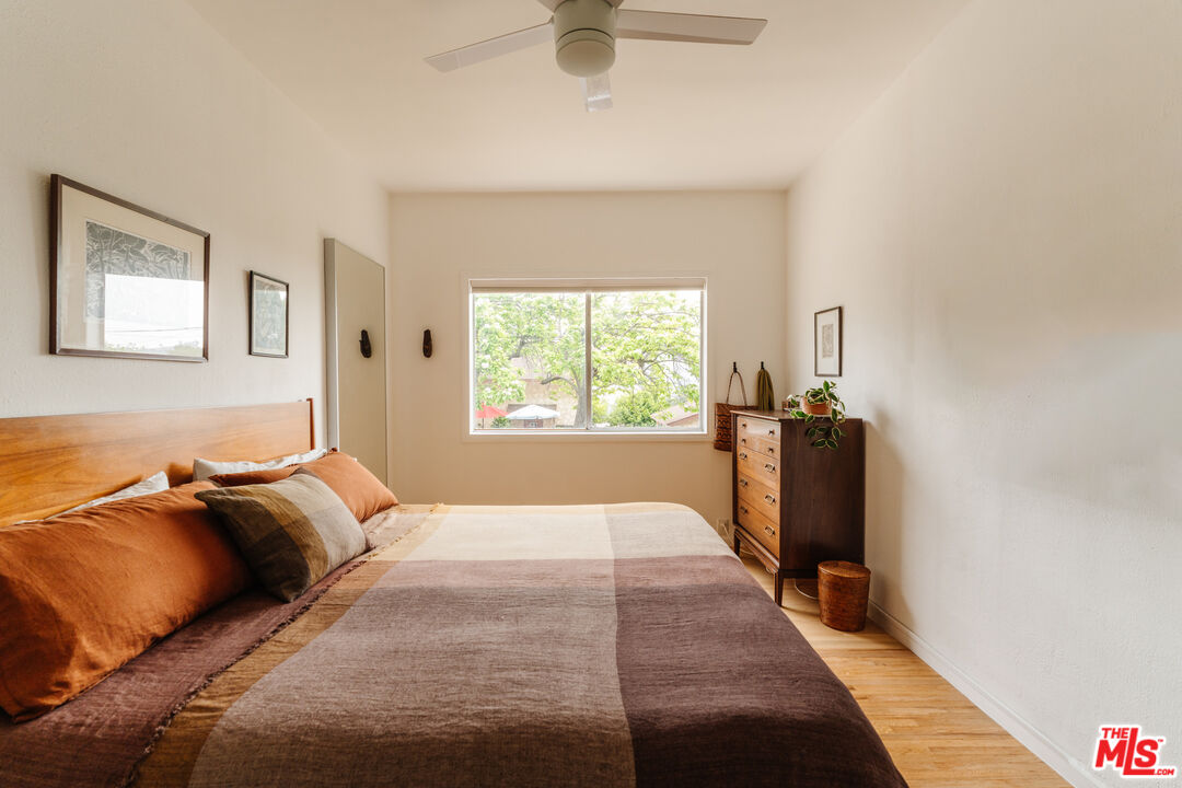 6457 Tokay Road Tujunga, CA 91042 - Photo 11 of 53 a bedroom with a bed and a window