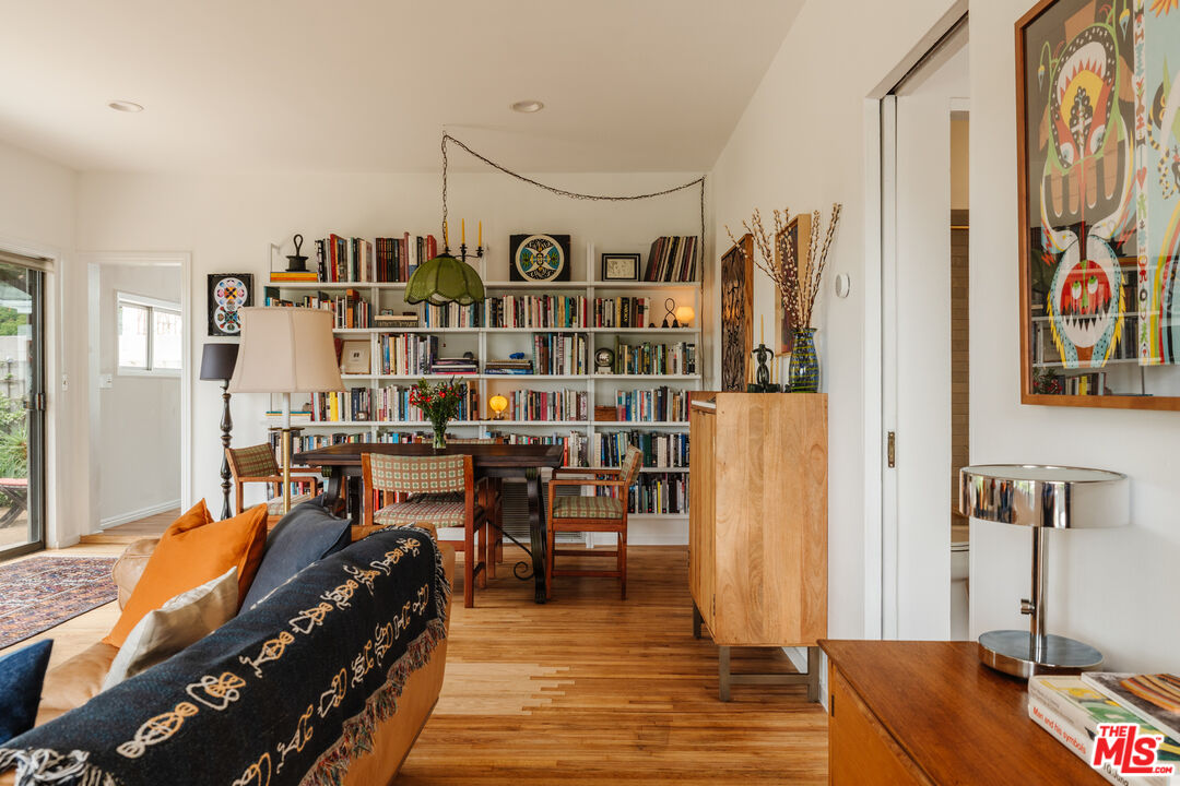 6457 Tokay Road Tujunga, CA 91042 - Photo 16 of 53 a living room with furniture and a book shelf