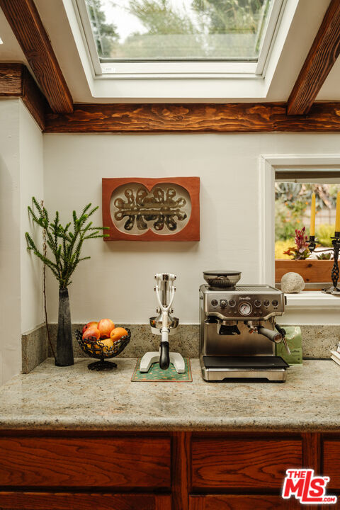 6457 Tokay Road Tujunga, CA 91042 - Photo 22 of 53 a kitchen with a stove and a potted plant