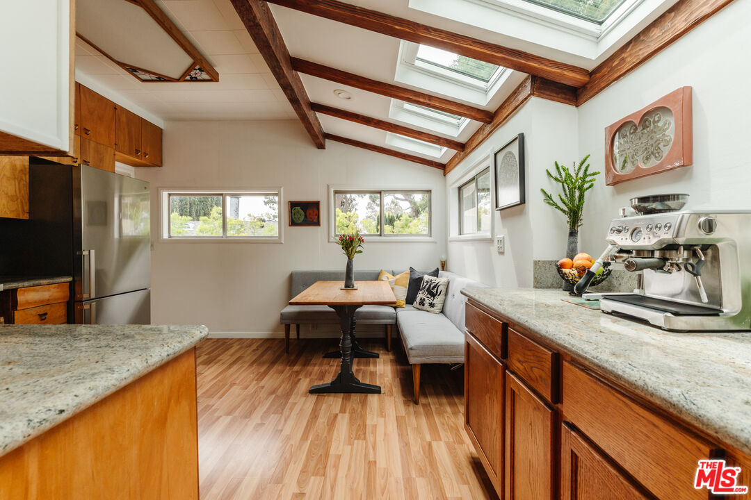 6457 Tokay Road Tujunga, CA 91042 - Photo 26 of 53 a living room with furniture and a flat screen tv