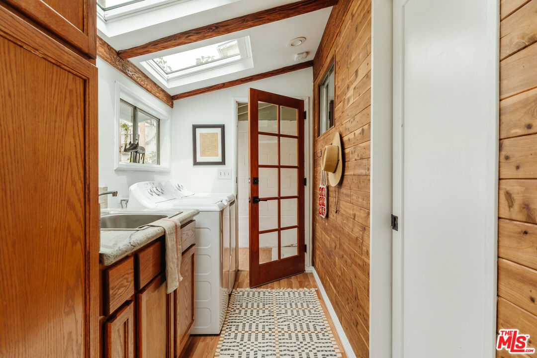 6457 Tokay Road Tujunga, CA 91042 - Photo 29 of 53 a bathroom with a sink and a shower