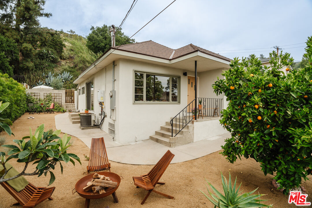 6457 Tokay Road Tujunga, CA 91042 - Photo 49 of 53 a view of a house with backyard and sitting area