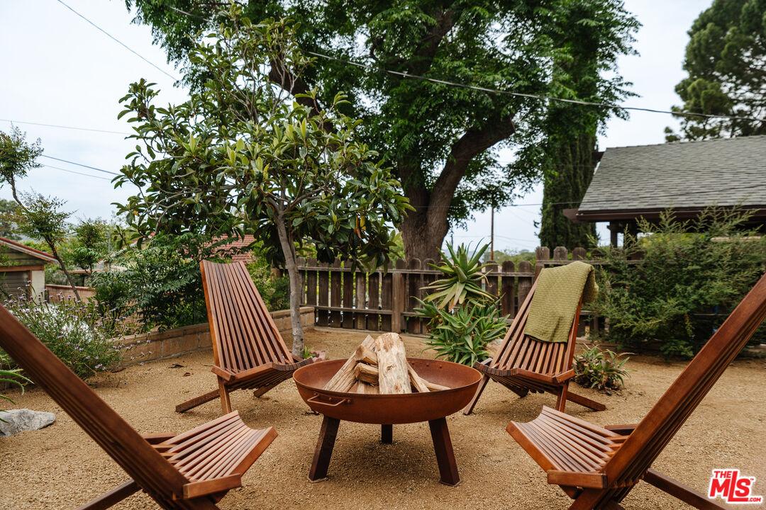 6457 Tokay Road Tujunga, CA 91042 - Photo 50 of 53 a view of a chairs and table in backyard