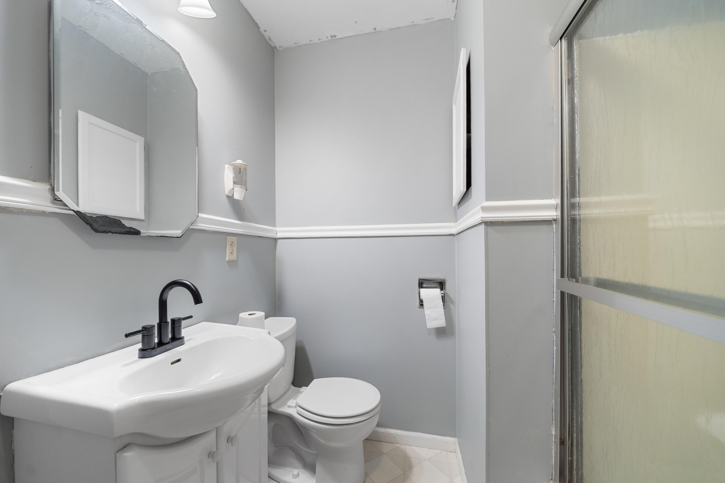 19610 14b Road Culver, IN 46511 - Photo 11 of 23 a bathroom with a sink and a toilet