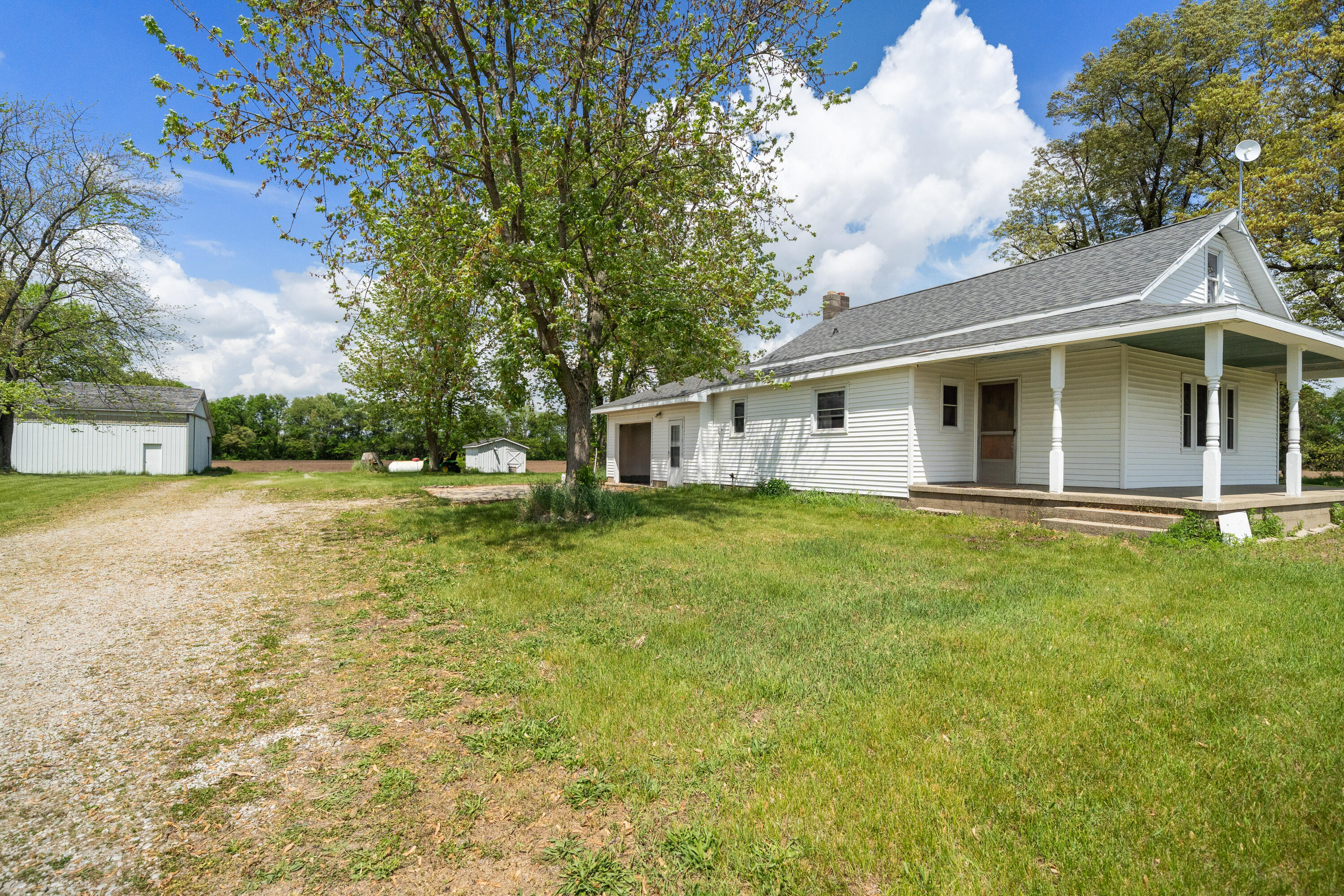 19610 14b Road Culver, IN 46511 - Photo 19 of 23 a view of a house with a yard