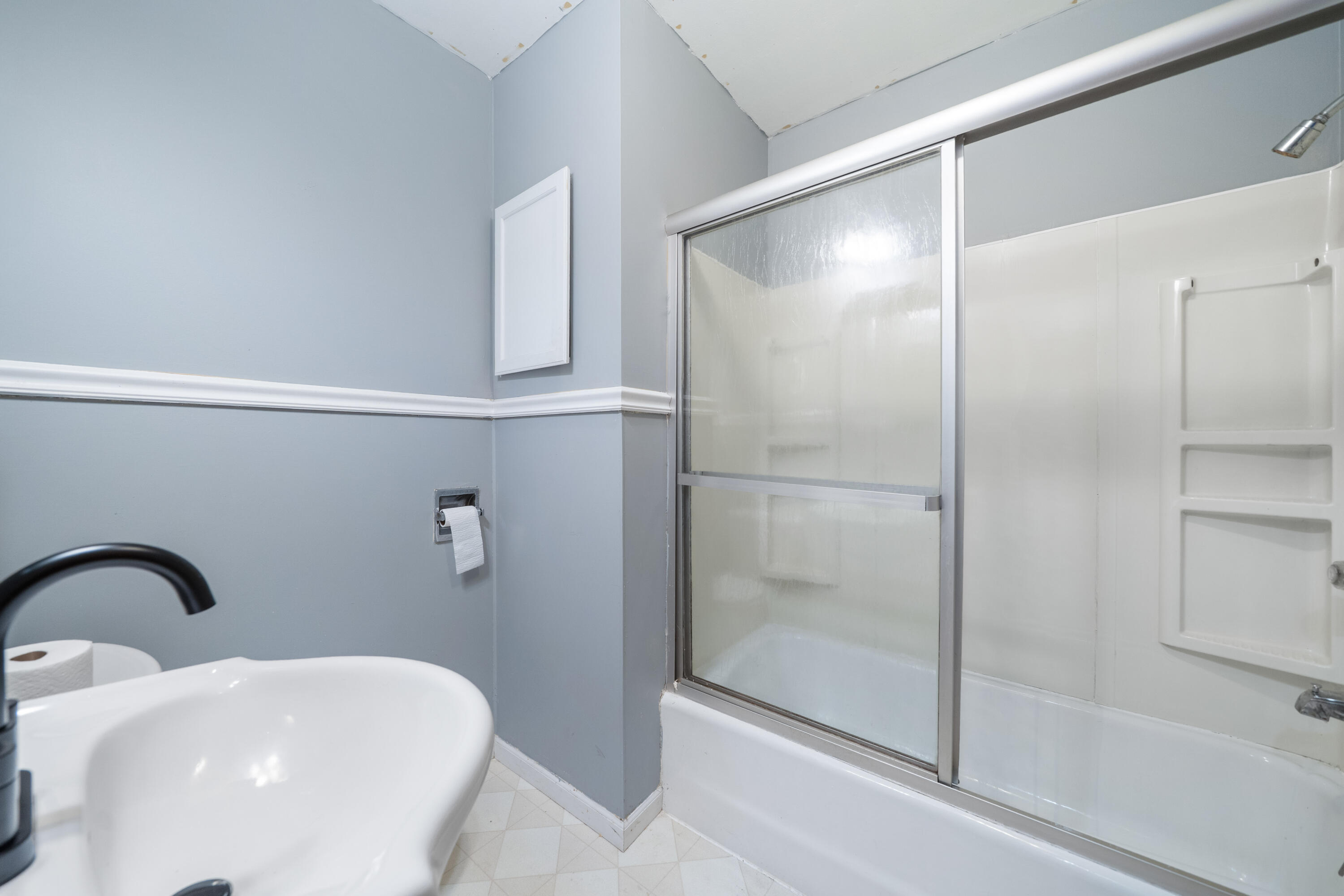 19610 14b Road Culver, IN 46511 - Photo 10 of 23 a bathroom with a bathtub and shower