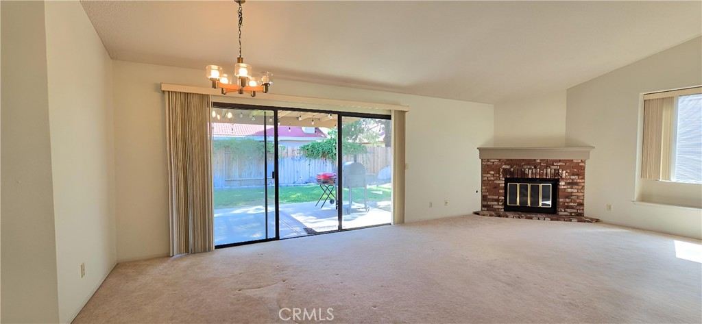 1101 North Heritage Drive Ridgecrest, CA 93555 - Photo 16 of 47 Sliding Door to Yard & Chimney