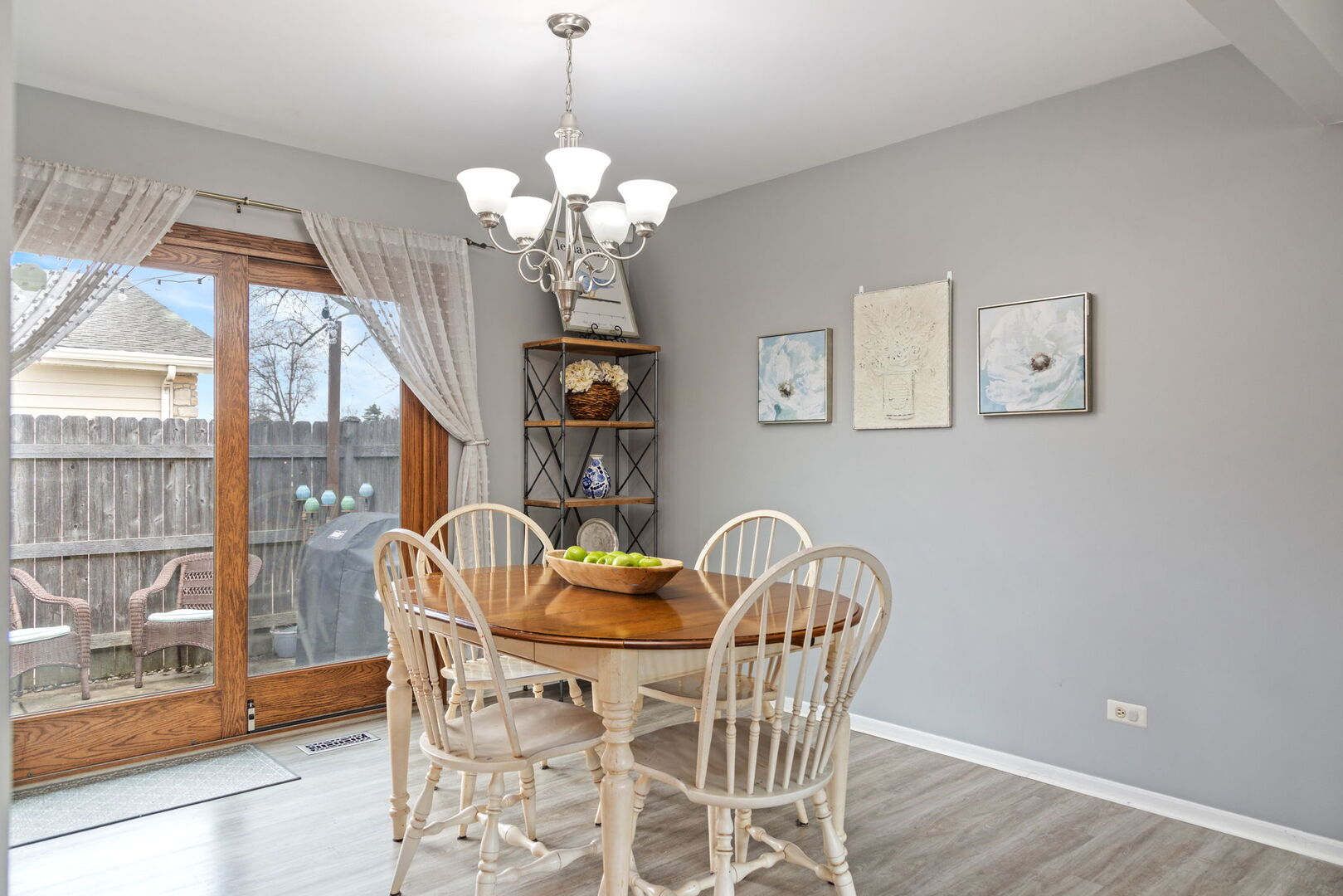 1N264 Darling Street Carol Stream, IL 60188 - Photo 11 of 30 a view of a dining room with furniture a chandelier and large windows