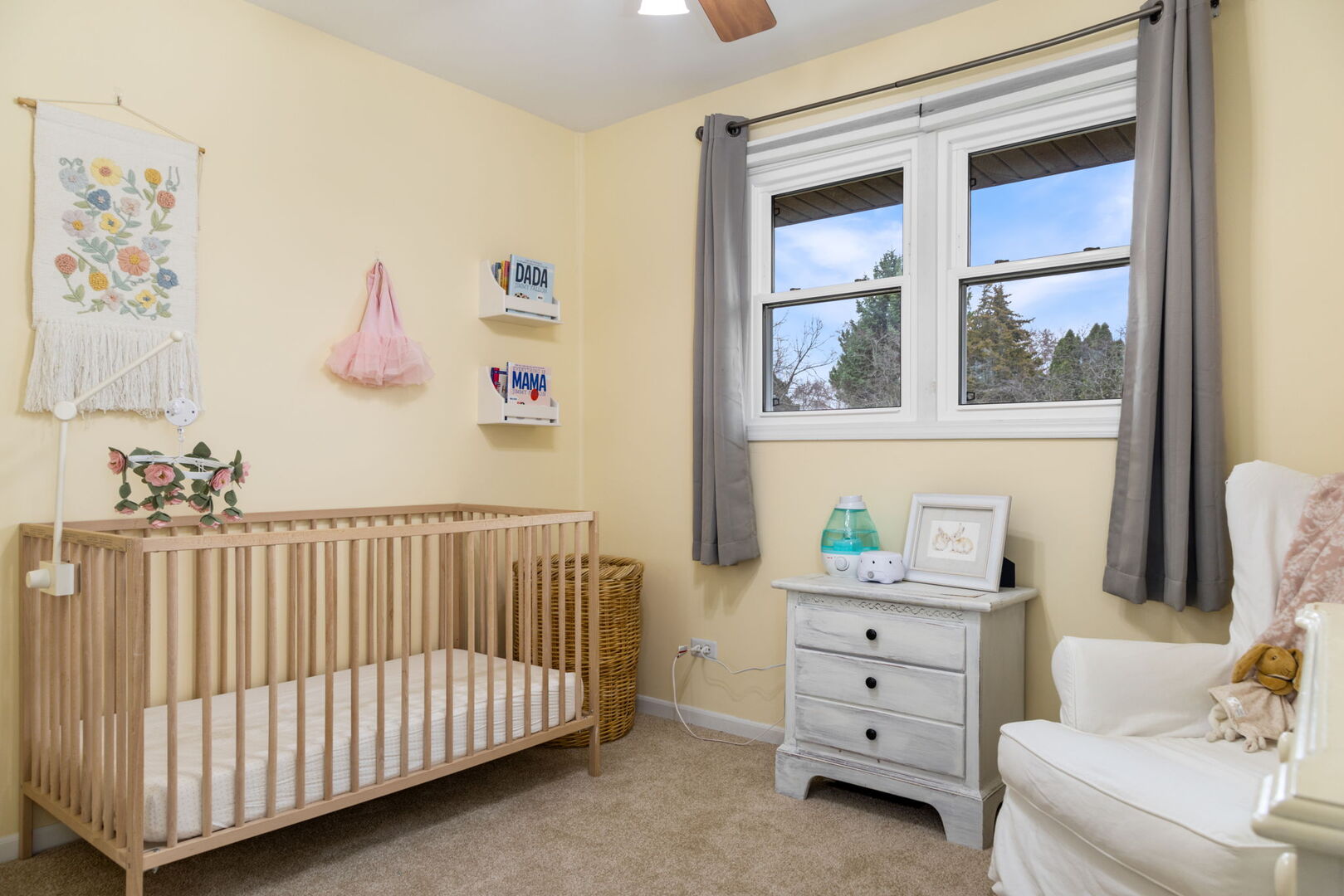 1N264 Darling Street Carol Stream, IL 60188 - Photo 18 of 30 a bedroom with a baby bed a couch and a window