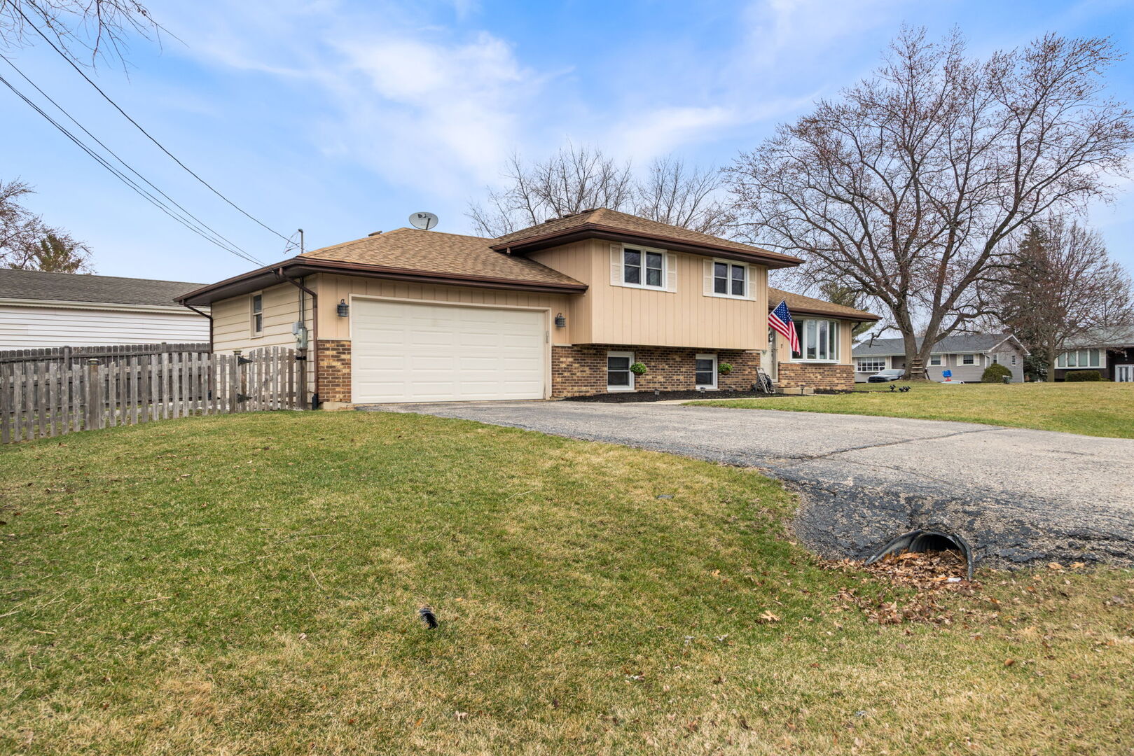 1N264 Darling Street Carol Stream, IL 60188 - Photo 2 of 30 a front view of a house with a yard