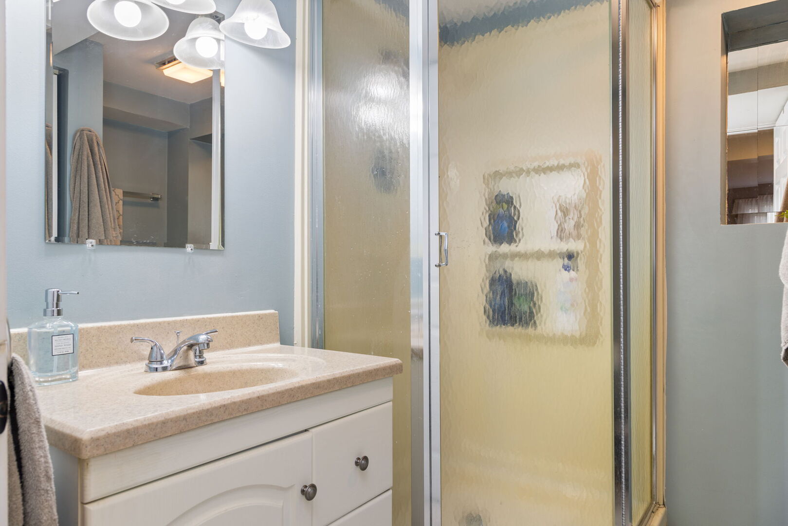 1N264 Darling Street Carol Stream, IL 60188 - Photo 23 of 30 a bathroom with a sink and a mirror