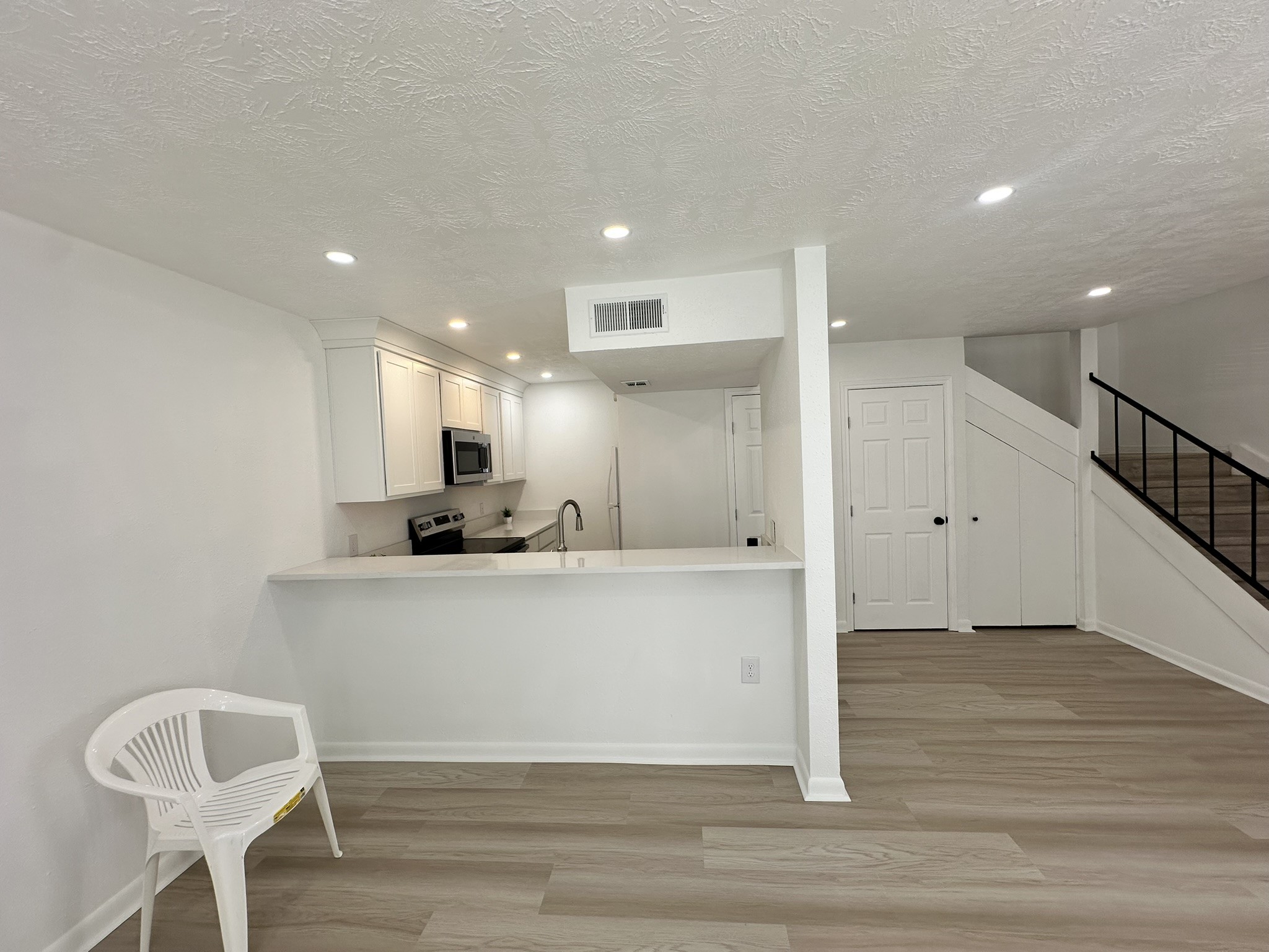 2800 Jeanetta Street, Unit 203 Houston, TX 77063 - Photo 14 of 34 a view of kitchen with wooden floor