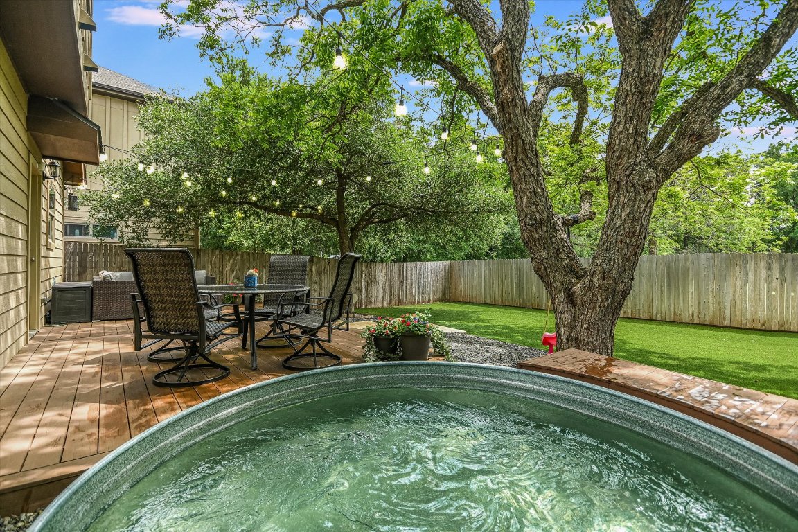 a view of a park with large trees