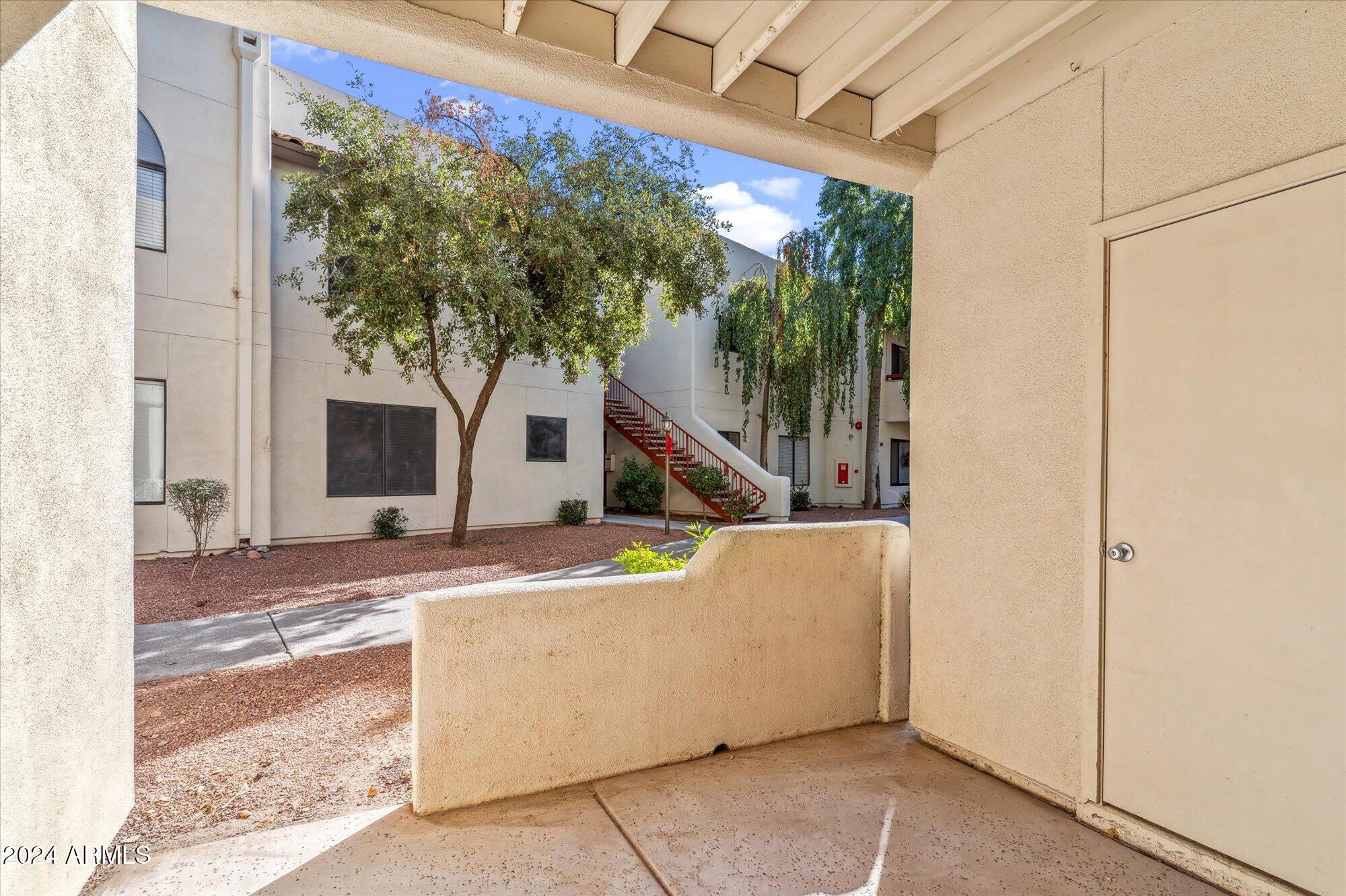 750 East Northern Avenue, Unit 1089 Phoenix, AZ 85020 - Photo 13 of 36 a house view with a outdoor space