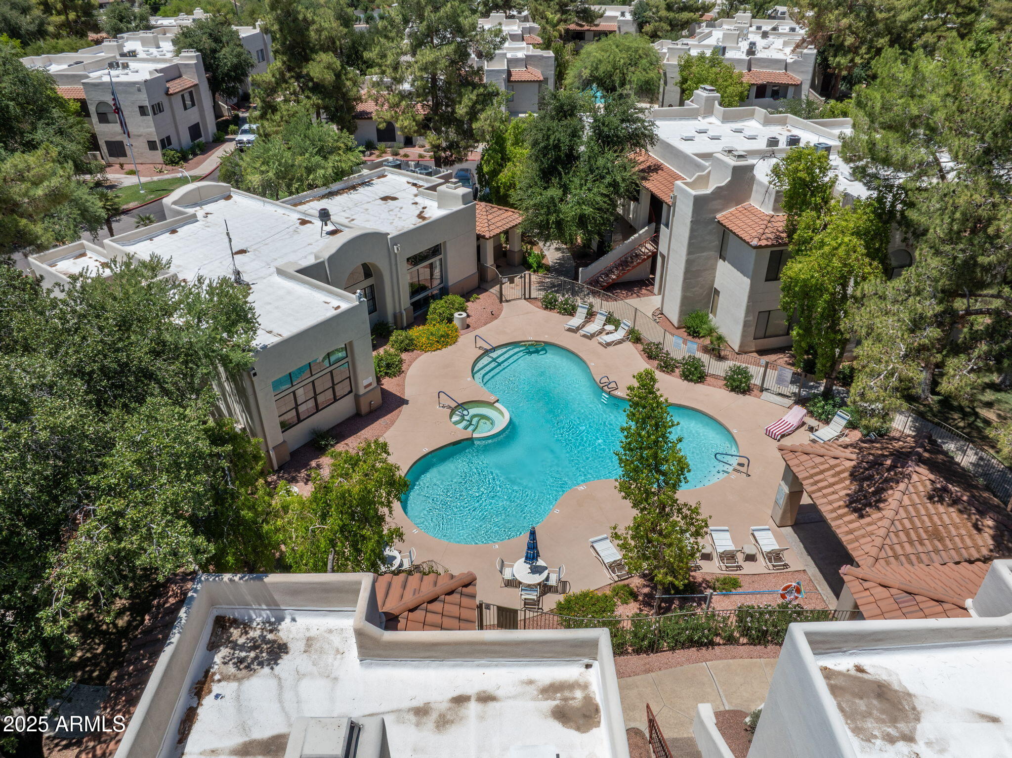 750 East Northern Avenue, Unit 1089 Phoenix, AZ 85020 - Photo 33 of 36 an aerial view of residential house with outdoor space and swimming pool