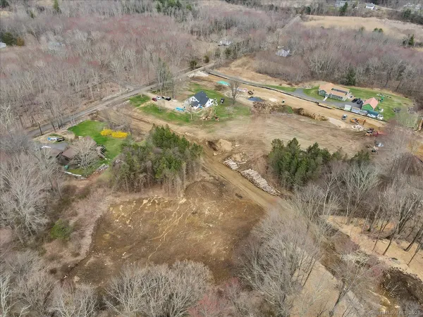 a view of a yard with an outdoor space