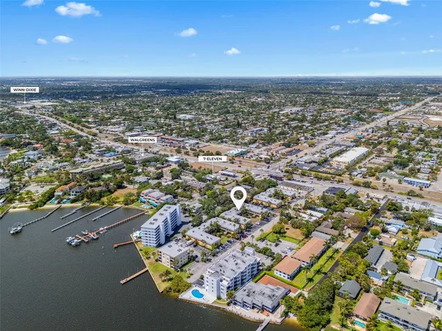 an aerial view of residential building with parking space