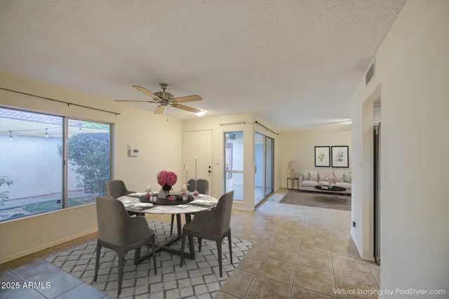 a view of kitchen and empty room