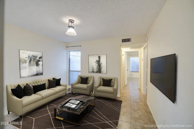 a view of an empty room with a bathroom