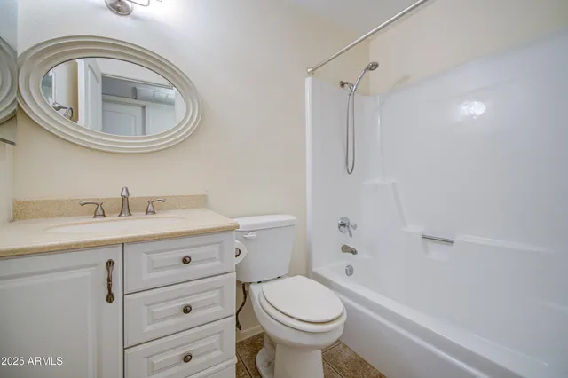 a kitchen with a sink and a stove top oven