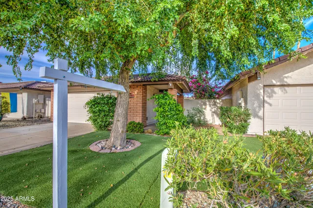 a view of a pathway with a patio