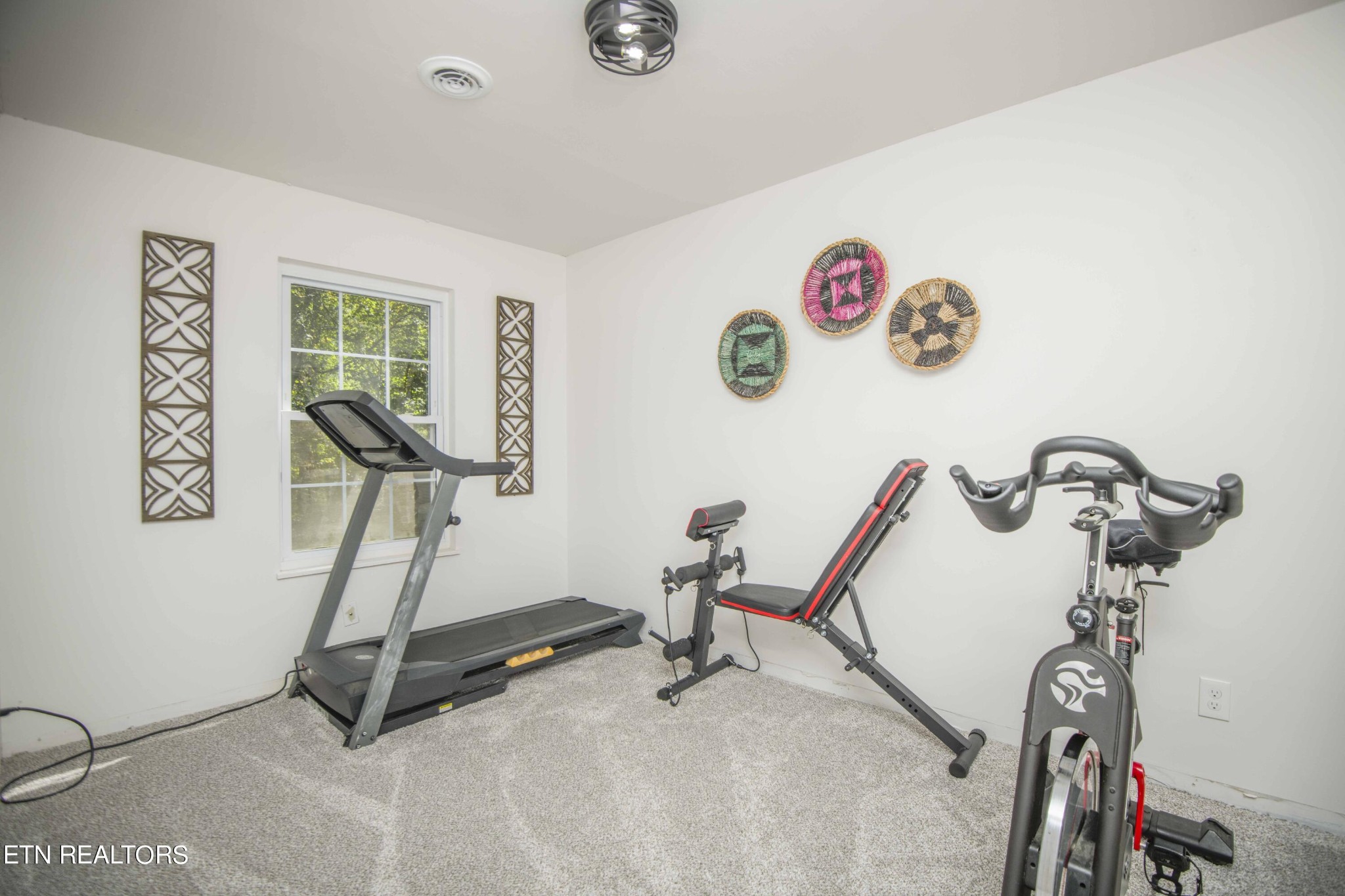 329 Hidden Valley Road Clinton, TN 37716 - Photo 15 of 29 a view of a room with gym equipment