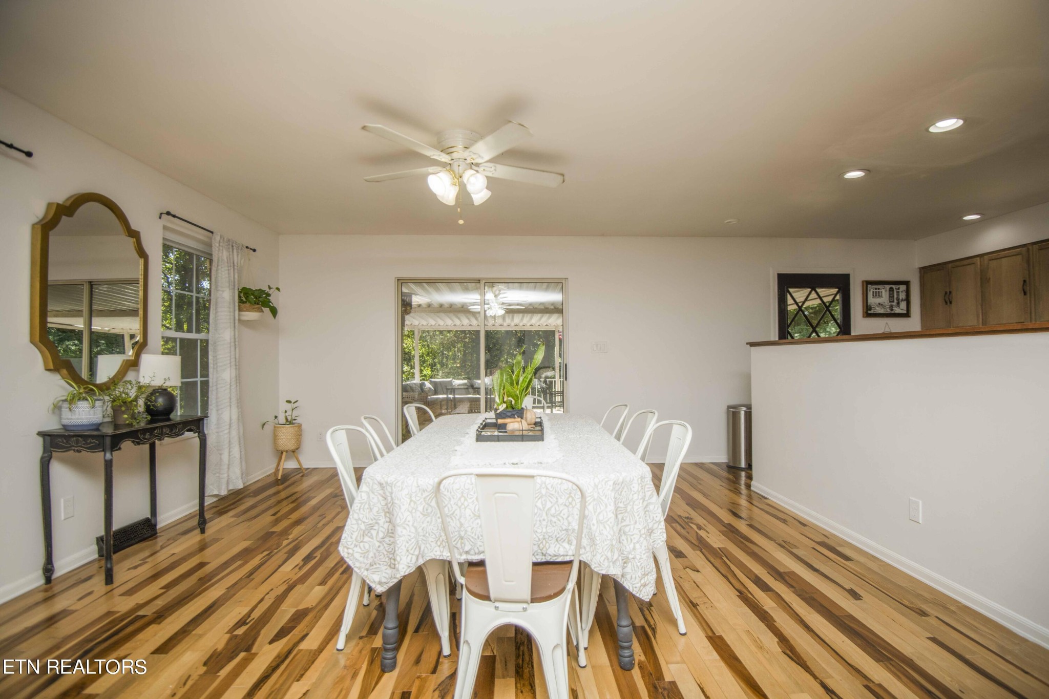 329 Hidden Valley Road Clinton, TN 37716 - Photo 27 of 29 a view of a dining room with furniture window and wooden floor
