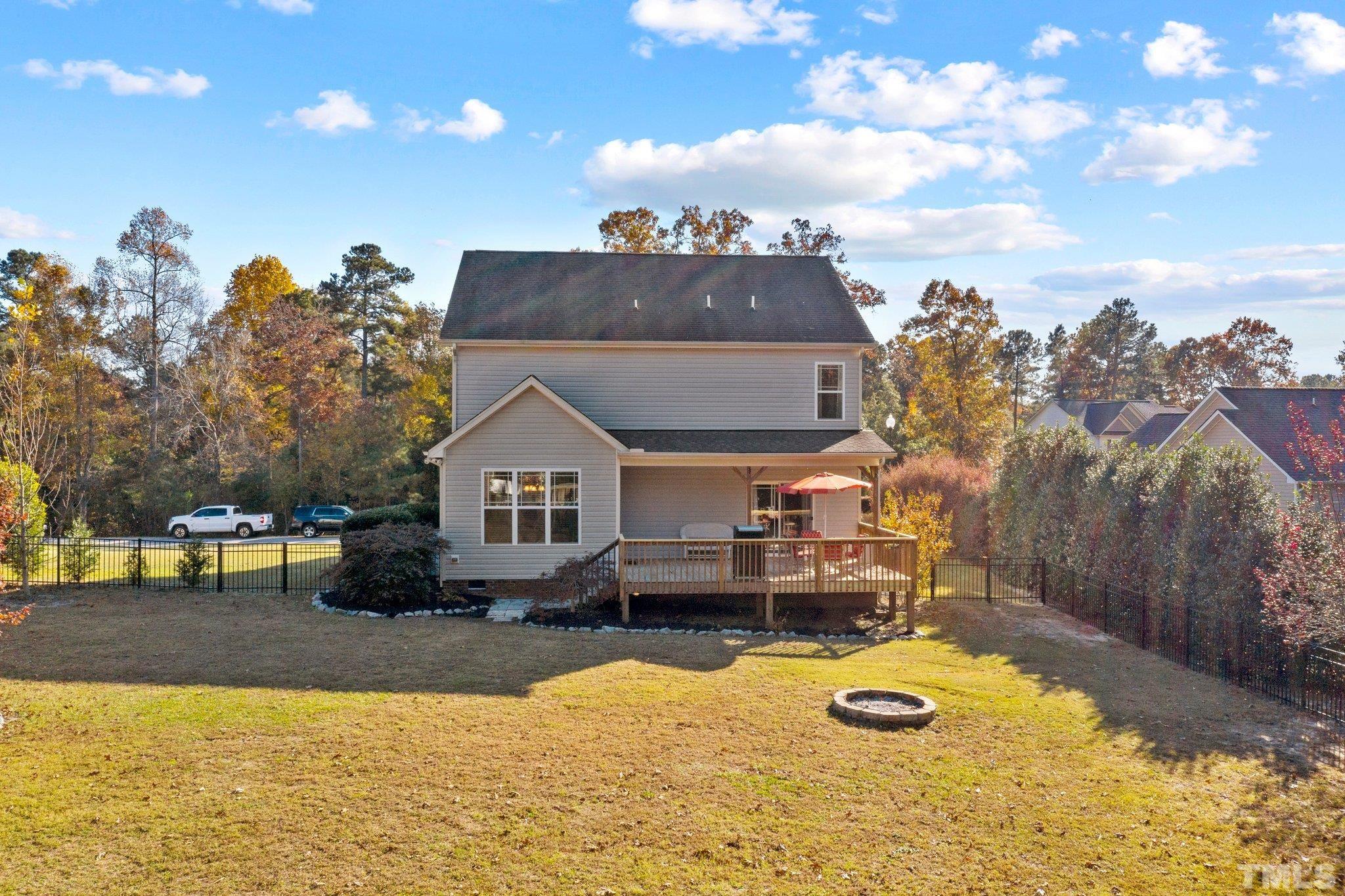 270 Timberland Drive Angier, NC 27501 - Photo 24 of 30 a view of a swimming pool with a patio