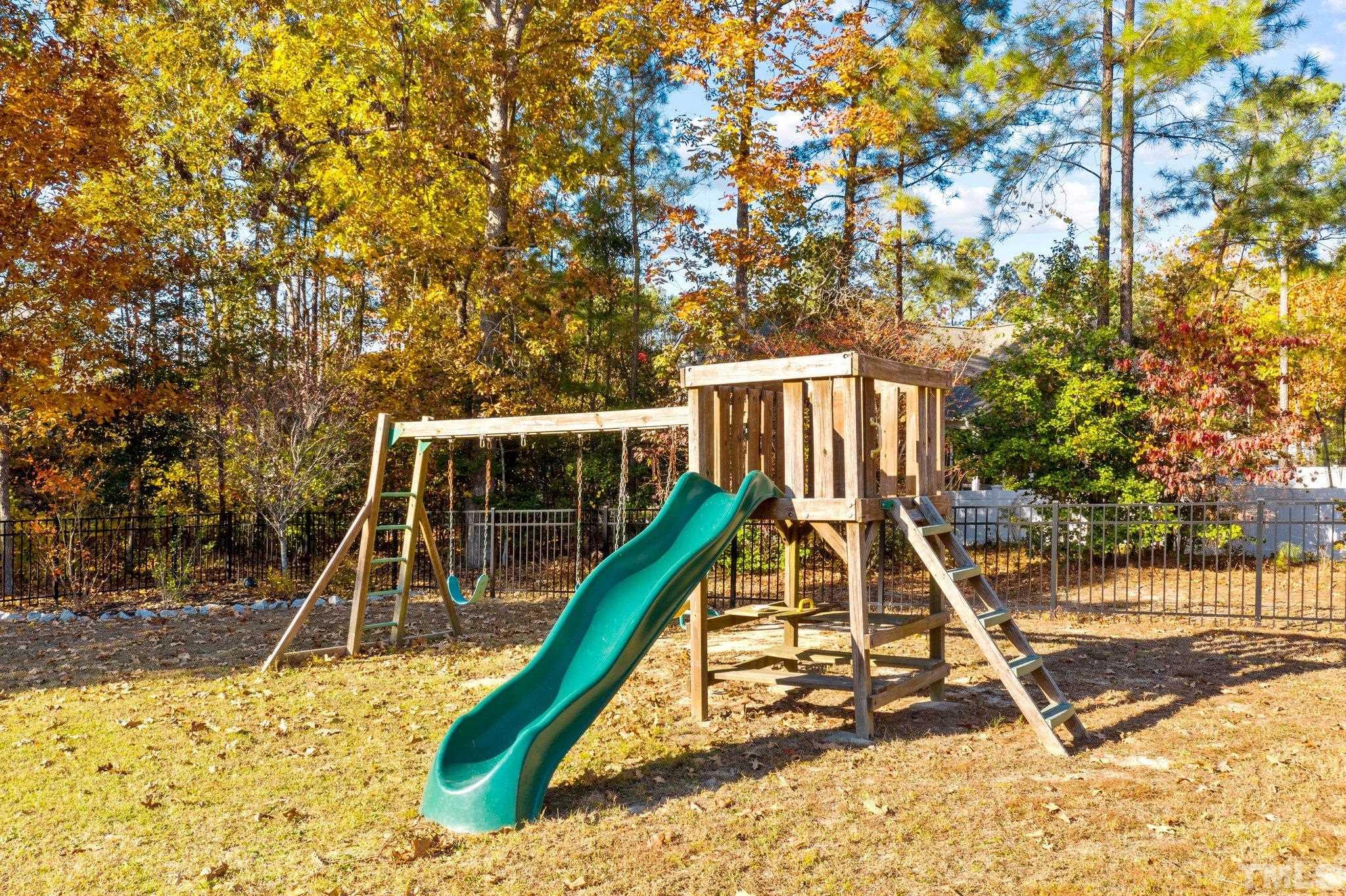 270 Timberland Drive Angier, NC 27501 - Photo 26 of 30 a view of a house with a park