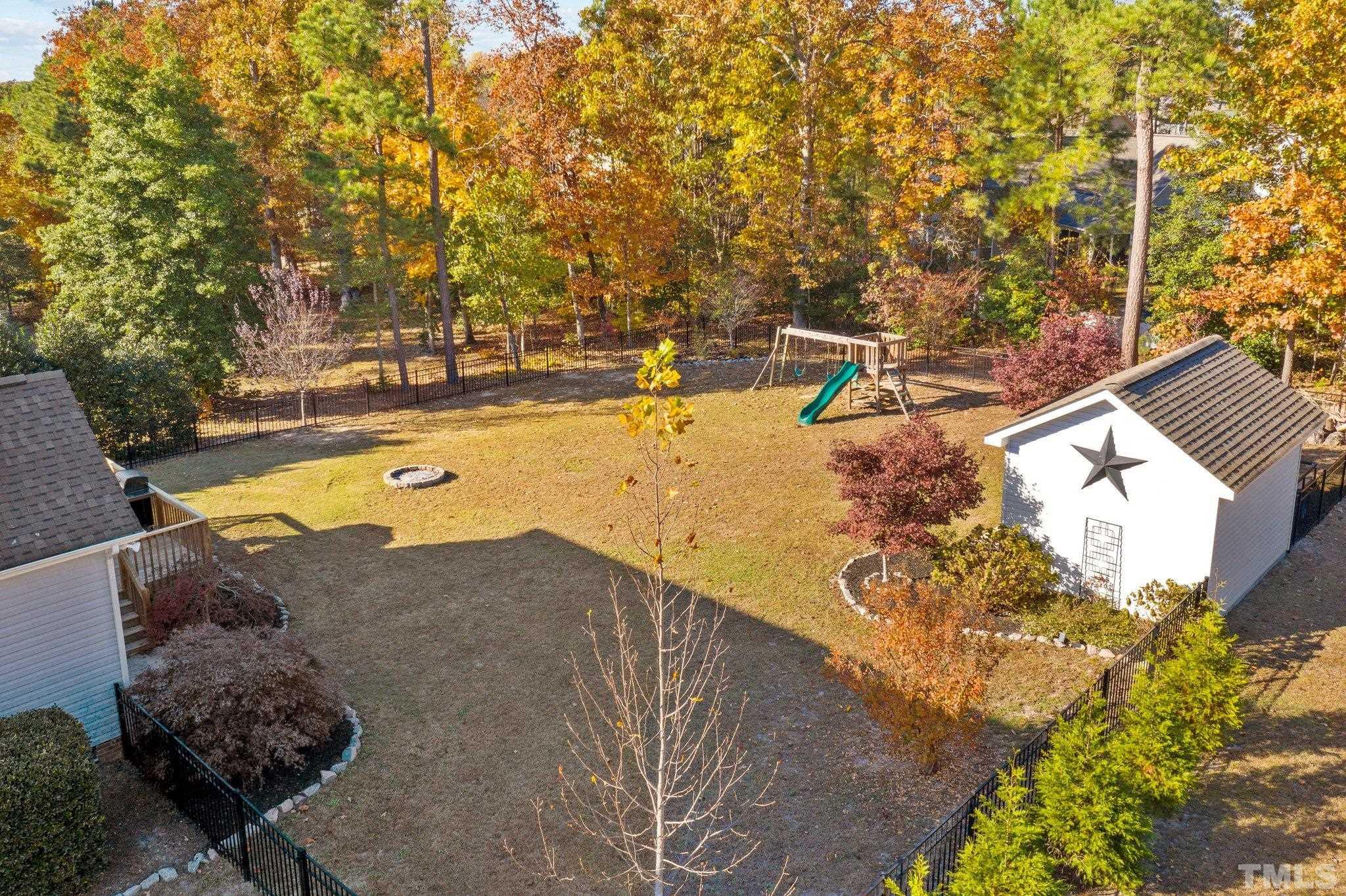 270 Timberland Drive Angier, NC 27501 - Photo 28 of 30 a view of a swimming pool with an outdoor space