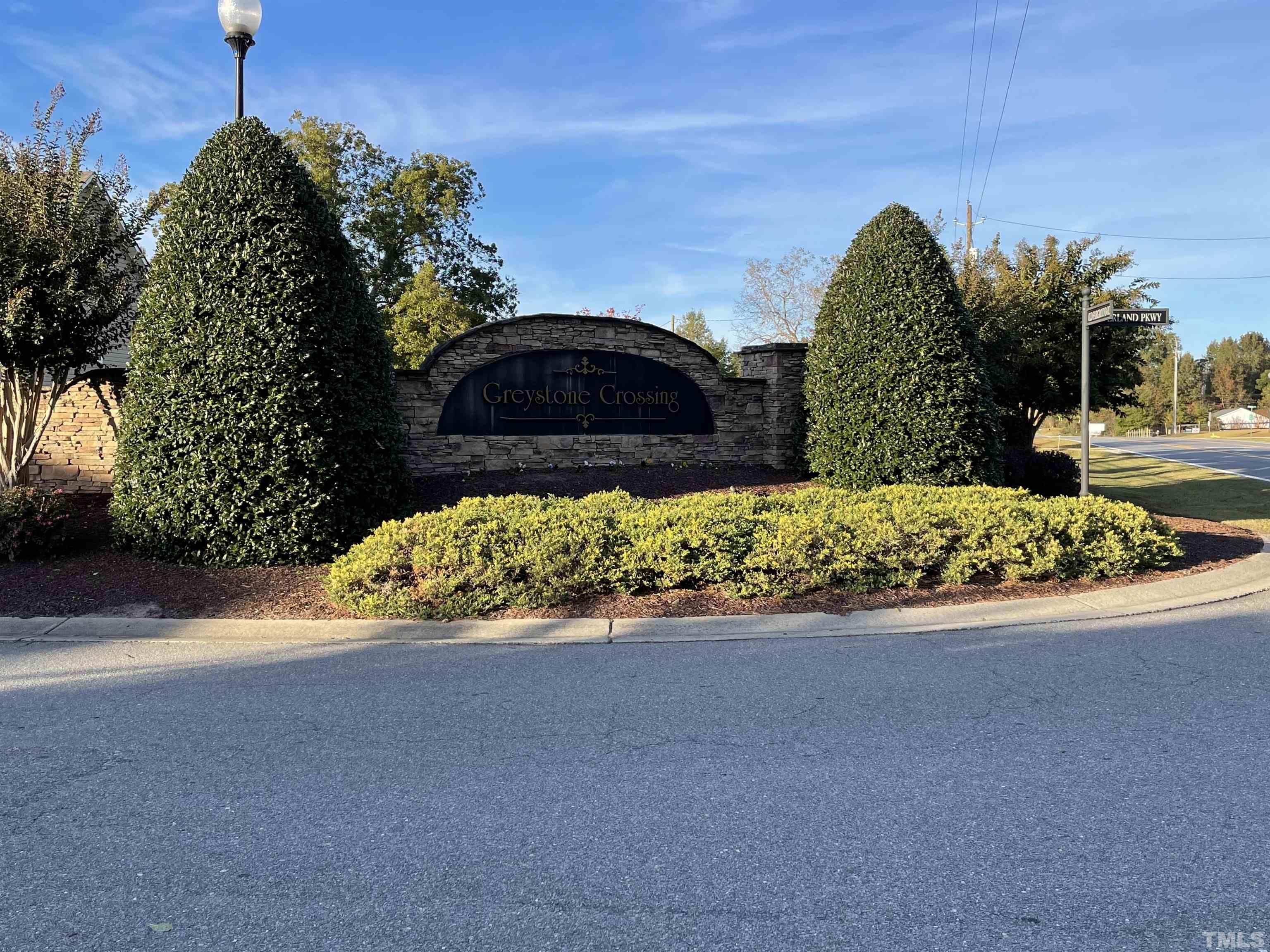 270 Timberland Drive Angier, NC 27501 - Photo 4 of 30 a view of a back yard of the house and cars parked