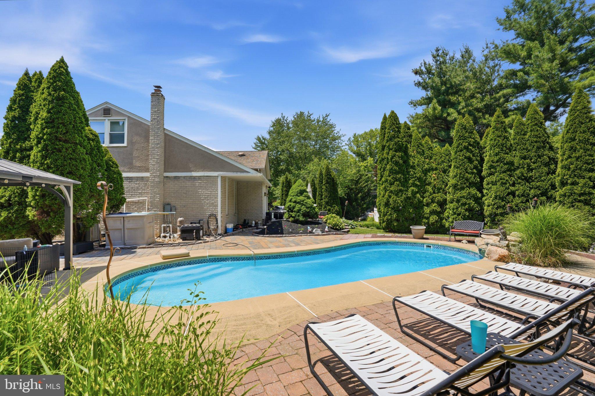 1002 Tannerie Run Road Ambler, PA 19002 - Photo 9 of 67 Serene backyard oasis with pool
