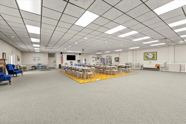 a kitchen with a sink appliances and cabinets