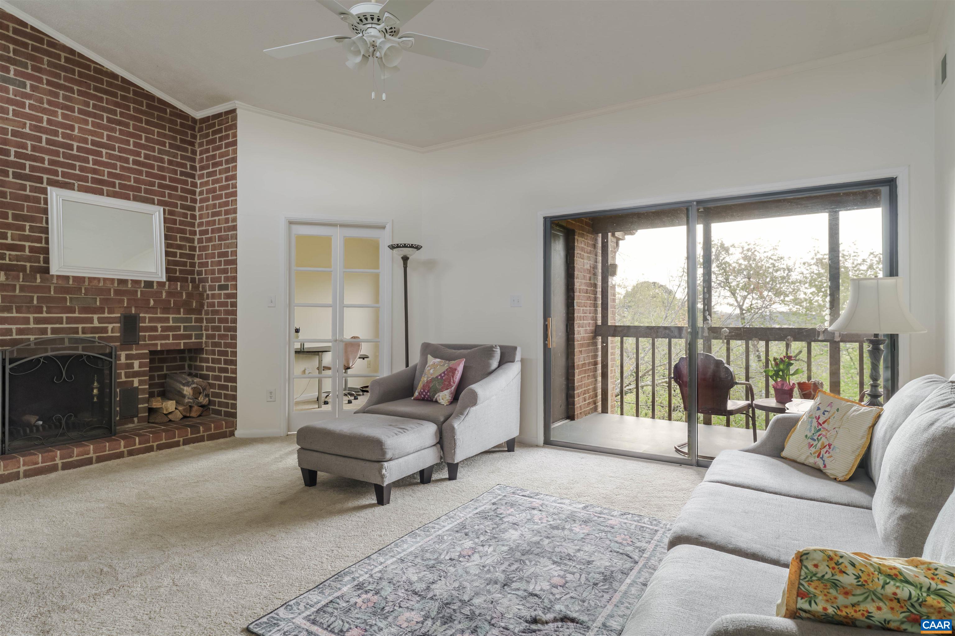 116 Turtle Creek Road, Unit 11 Charlottesville, VA 22901 - Photo 2 of 22 Great room w/ fireplace