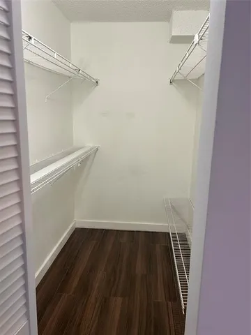 a view of small space with racks on the wall