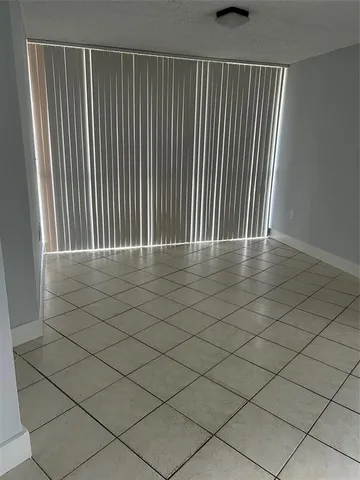 a view of outdoor space and wooden floor