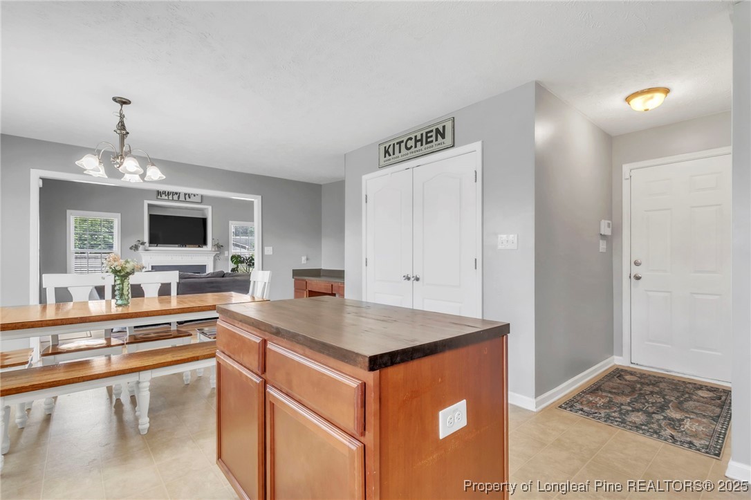 665 Cape Fear Road Raeford, NC 28376 - Photo 14 of 33 a open kitchen with stainless steel appliances granite countertop a sink stove and refrigerator