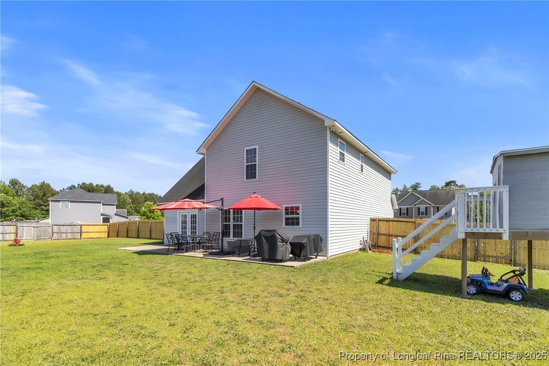 665 Cape Fear Road Raeford, NC 28376 - Photo 29 of 33 a view of a house with a swimming pool