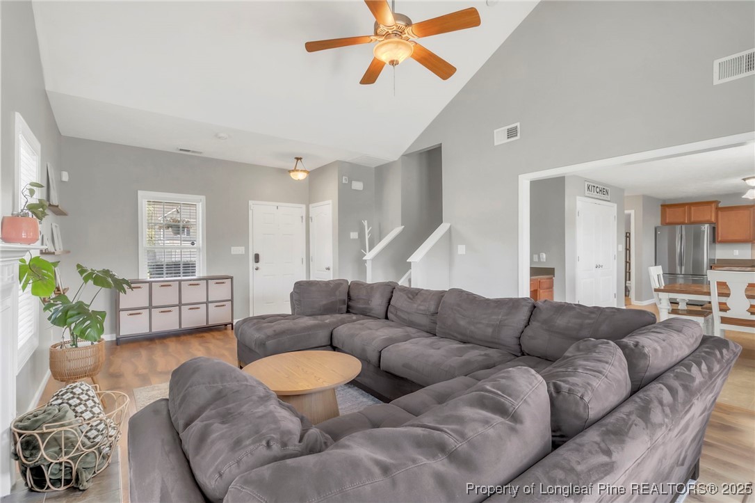 665 Cape Fear Road Raeford, NC 28376 - Photo 8 of 33 a living room with furniture and a ceiling fan