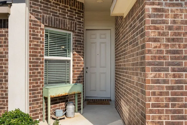 a view of a door and chair