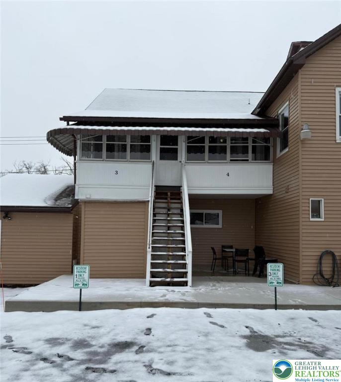 22 Front Street, Unit 4 Alburtis, PA 18011 - Photo 2 of 14 a front view of a house with garden