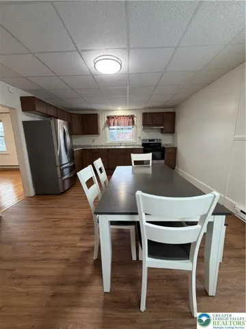 a view of a dining room with furniture