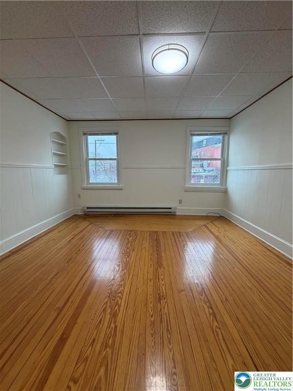 22 Front Street, Unit 4 Alburtis, PA 18011 - Photo 6 of 14 an empty room with wooden floor and windows