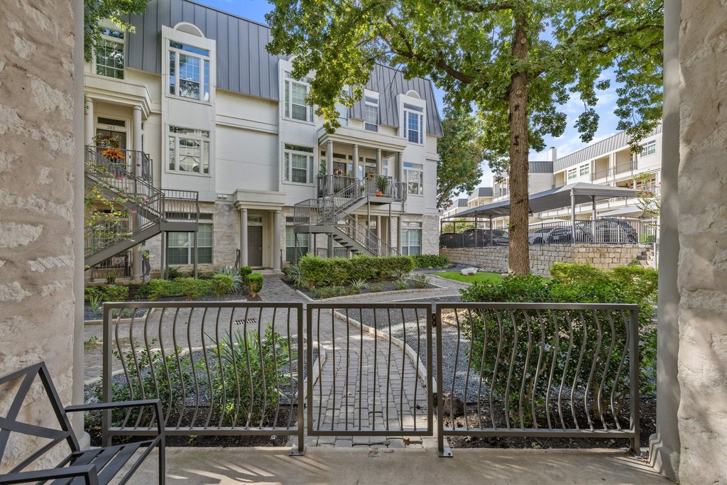 2918 Ranch Road 620 North, Unit 268 Austin, TX 78734 - Photo 26 of 40 Gated patio entry leads to beautifully landscaped common areas.