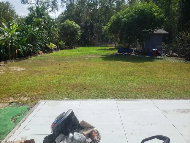 a view of a lake with a sitting area