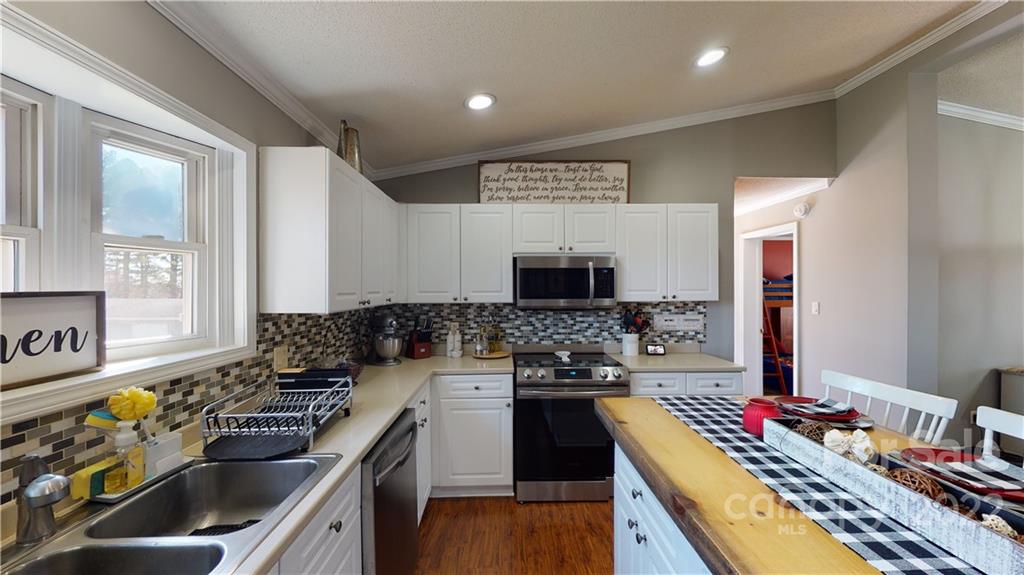 2130 Peeler Road Vale, NC 28168 - Photo 11 of 29 a kitchen with a stove and a sink