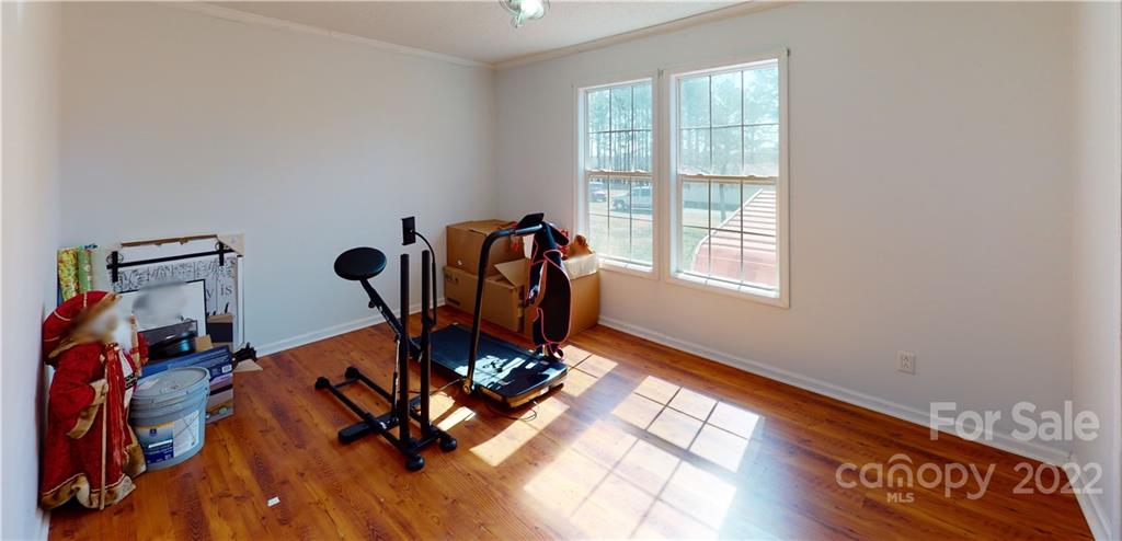 2130 Peeler Road Vale, NC 28168 - Photo 22 of 29 a view of a workspace with furniture and a window
