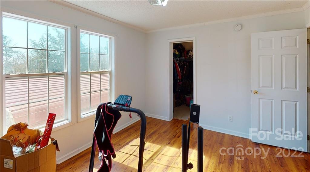 2130 Peeler Road Vale, NC 28168 - Photo 23 of 29 a view of a room with lounge chair and windows
