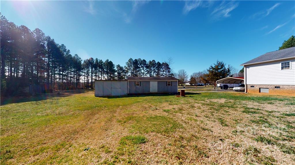 2130 Peeler Road Vale, NC 28168 - Photo 27 of 29 a house view with a garden space
