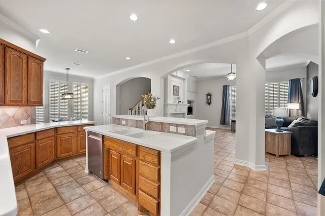 a view of a house with a yard and sitting area